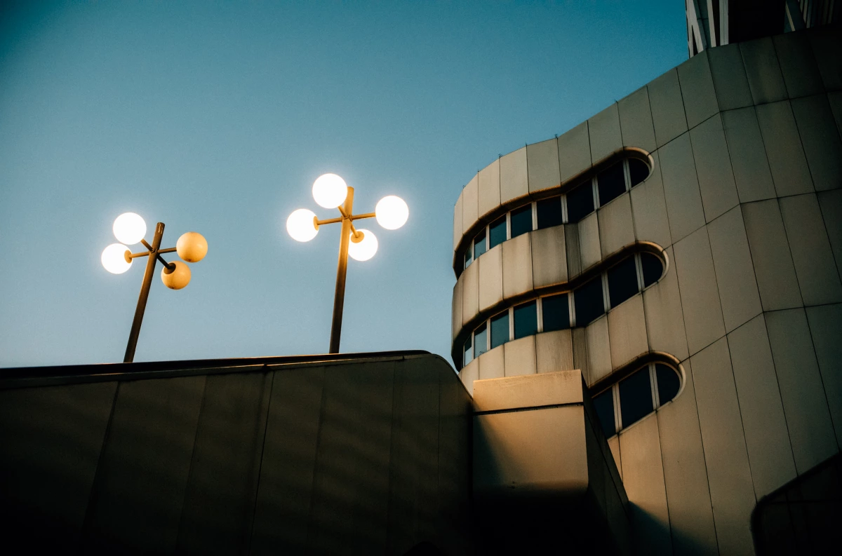 Lamps and aluminum-clad stair towers of the ICC